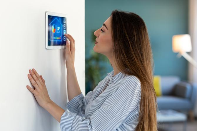 A woman controlling her smart home