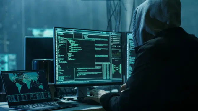 A man launches a DDoS attack example.