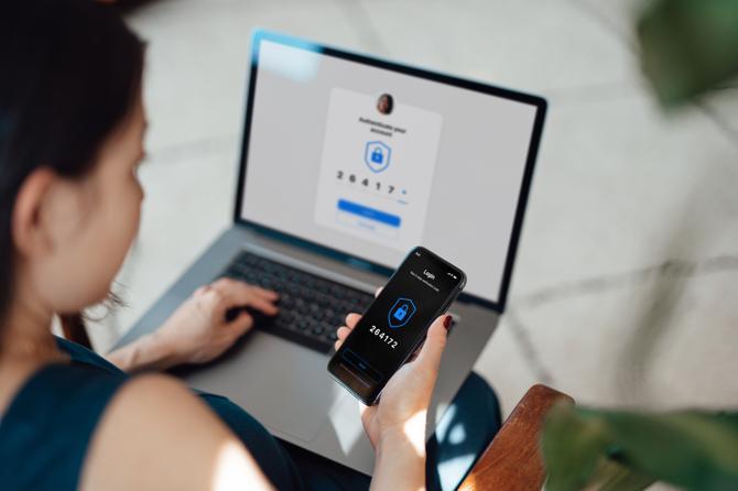 A woman logging on to an online banking site