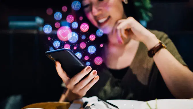 A woman is looking at her phone