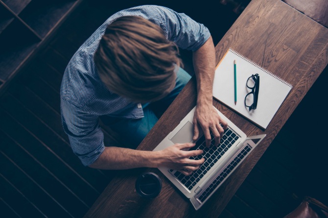 A man working at a laptop