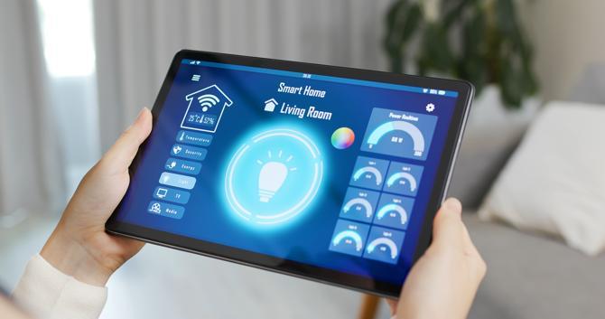 A girl interacts with her smart home via a tablet