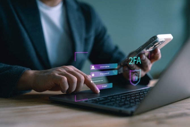 A man uses 2Fa for cybersecurity while online