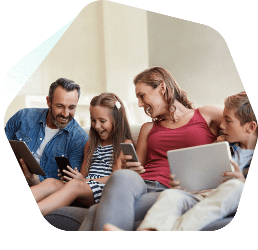 Family at home using their devices 