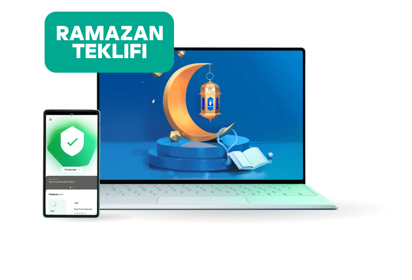 Happy couple smiling while browsing on a laptop