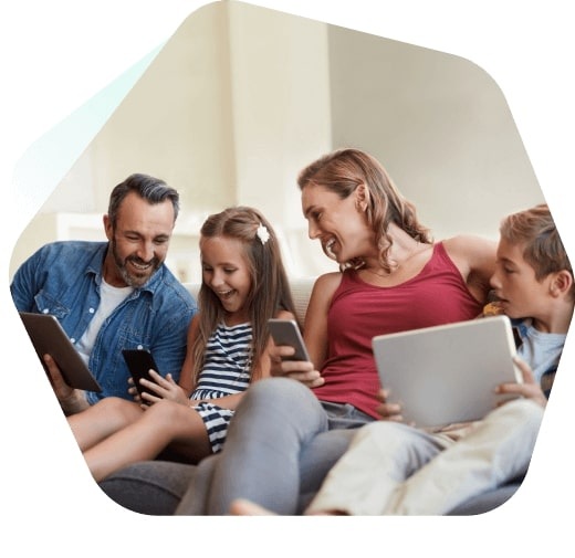 Family at home using their devices 