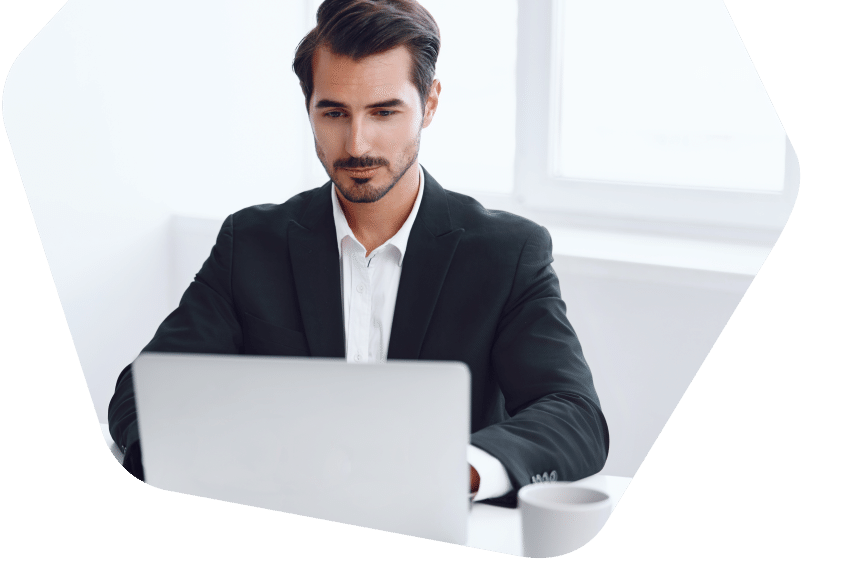 Man looks into the laptop