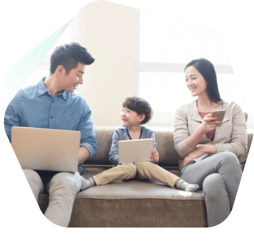 Family at home using their devices 