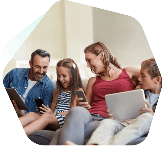 Family at home using their devices