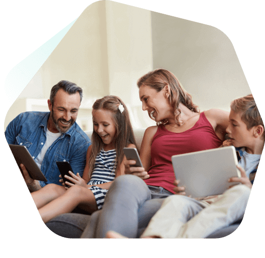 Family at home using their devices 