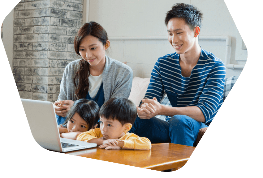 Parents and daughter using their laptop