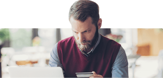 Man purchasing online using his credit card