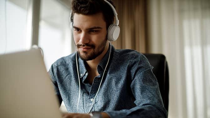 man working on laptop