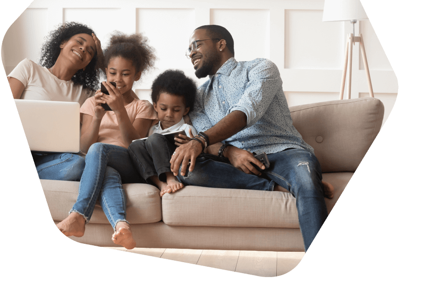 Family at home using their devices 