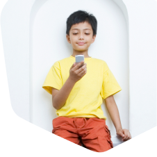 Boy looking at his mobile phone