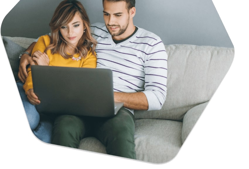 couple watching at the laptop together